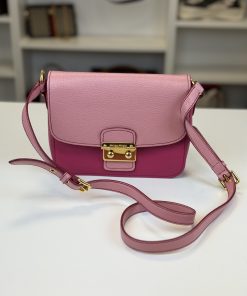Borsa a tracolla Miu Miu in pelle martellata bicolore rosa e fucsia