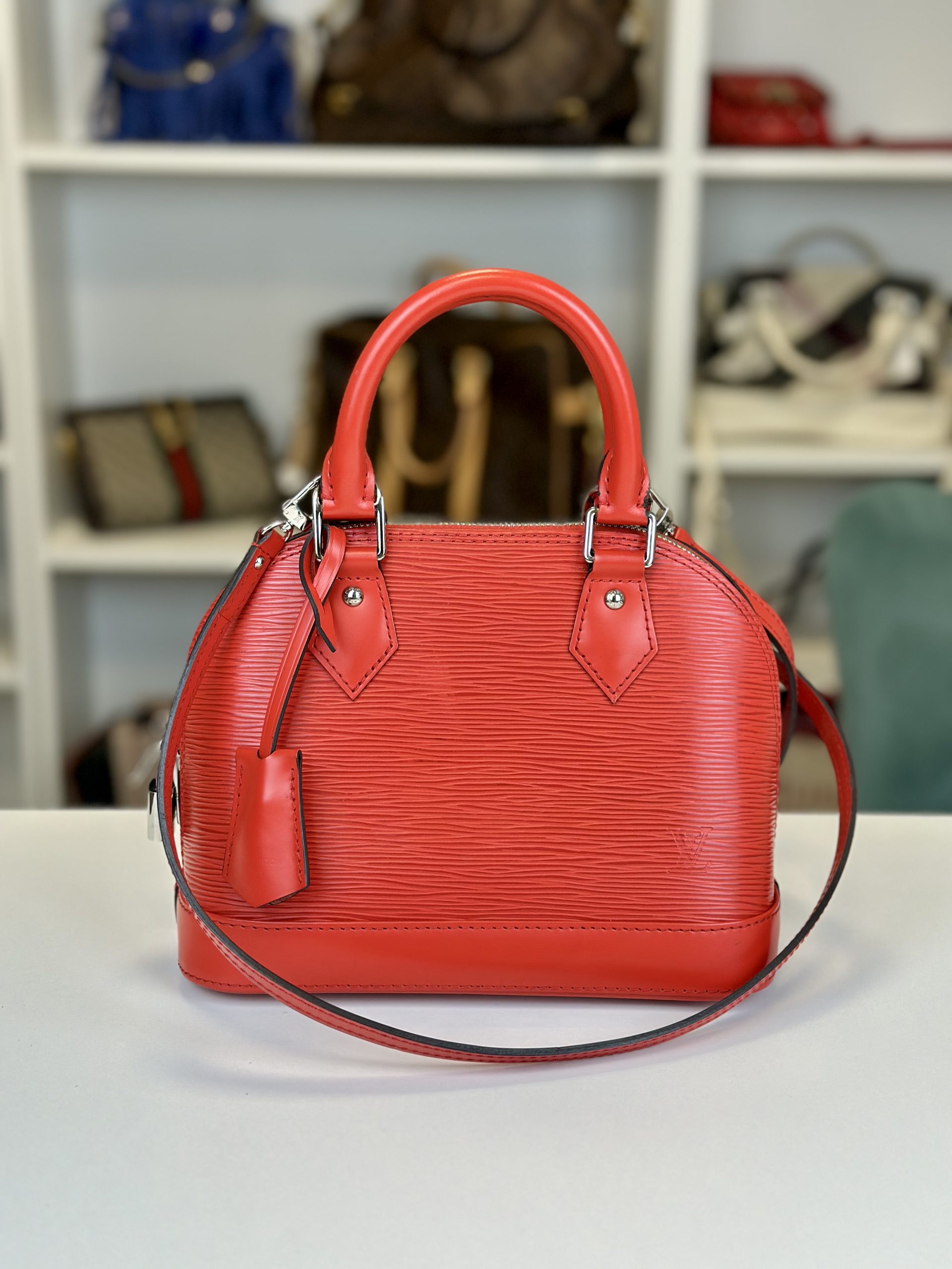 Borsa Tracolla Louis Vuitton Alma BB in pelle Epi Rossa