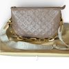 Borsa Coussin Louis Vuitton in Pelle Tortora